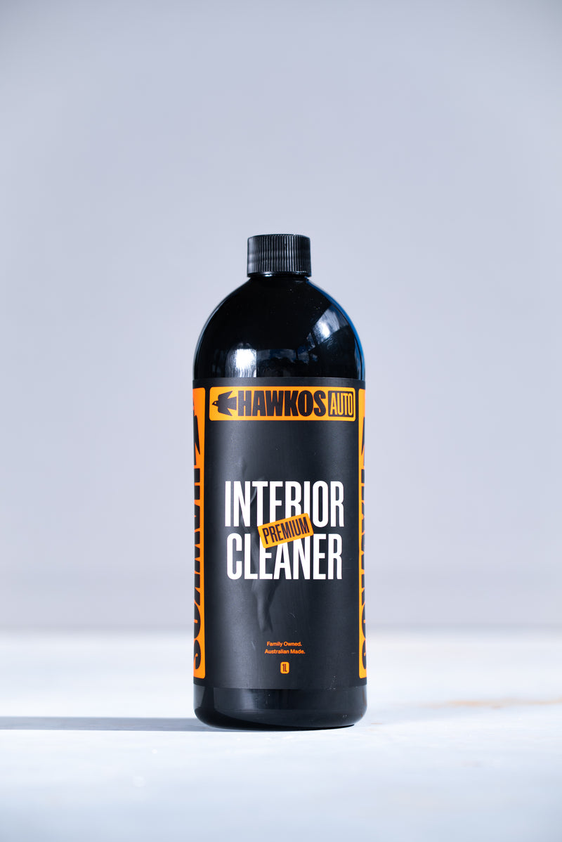 Load image into Gallery viewer, Hawkos Interior Cleaner being wiped onto a car dashboard
