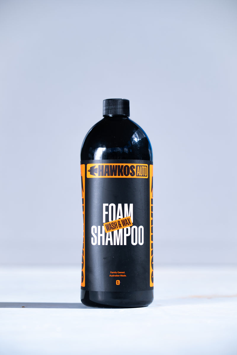 Load image into Gallery viewer, Thick foam from Hawkos Wash and Wax shampoo on a car panel
