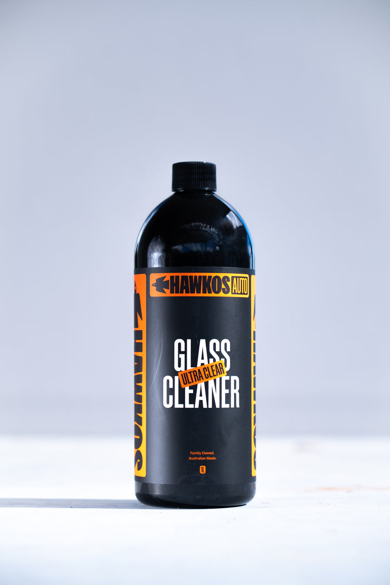 Load image into Gallery viewer, Hawkos Glass Cleaner being used on a car window
